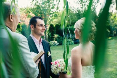 Bride and groom at their wedding ceremony in Coeur d'Alene