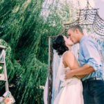 Bride and groom kissing