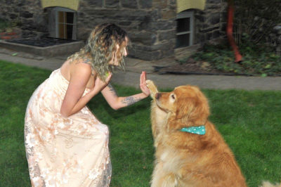 Girl in a dress with a dog